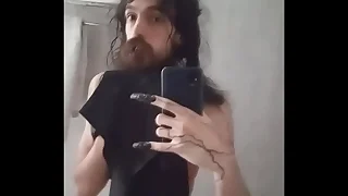 Femenine boy with big horseshit in mirror