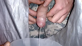 Army guy takes piss through gloryhole